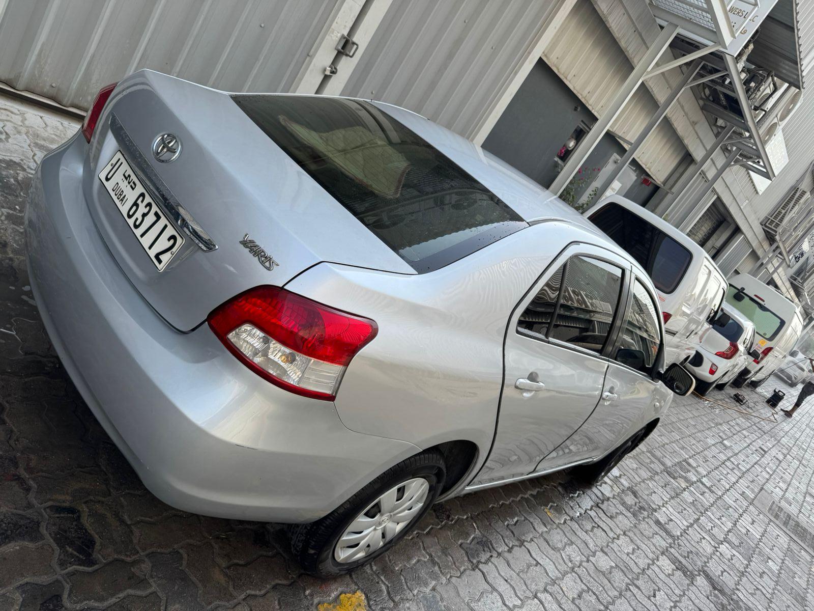 Silver Toyota Yaris, rear view