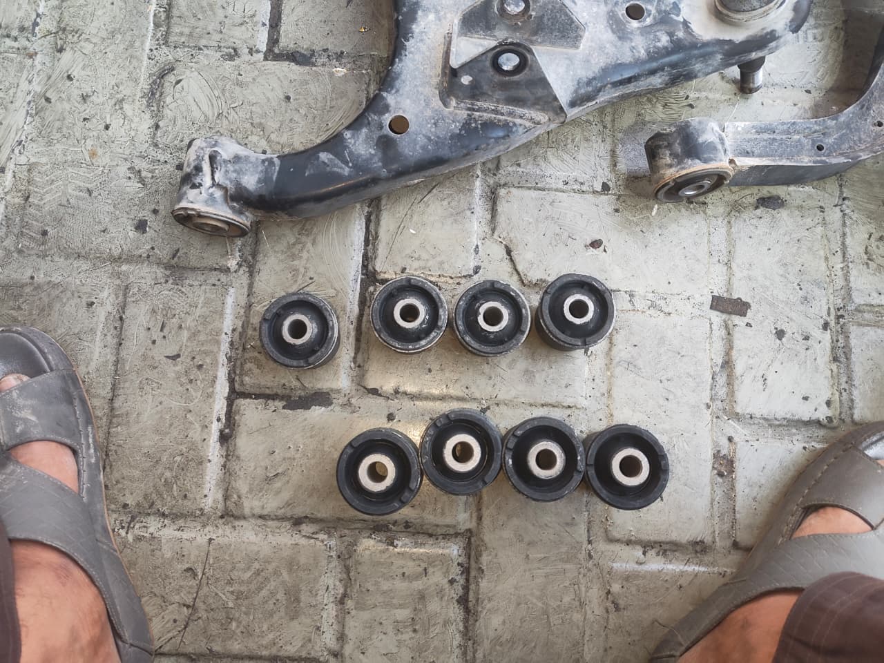 Suspension control arm and bushing set close up