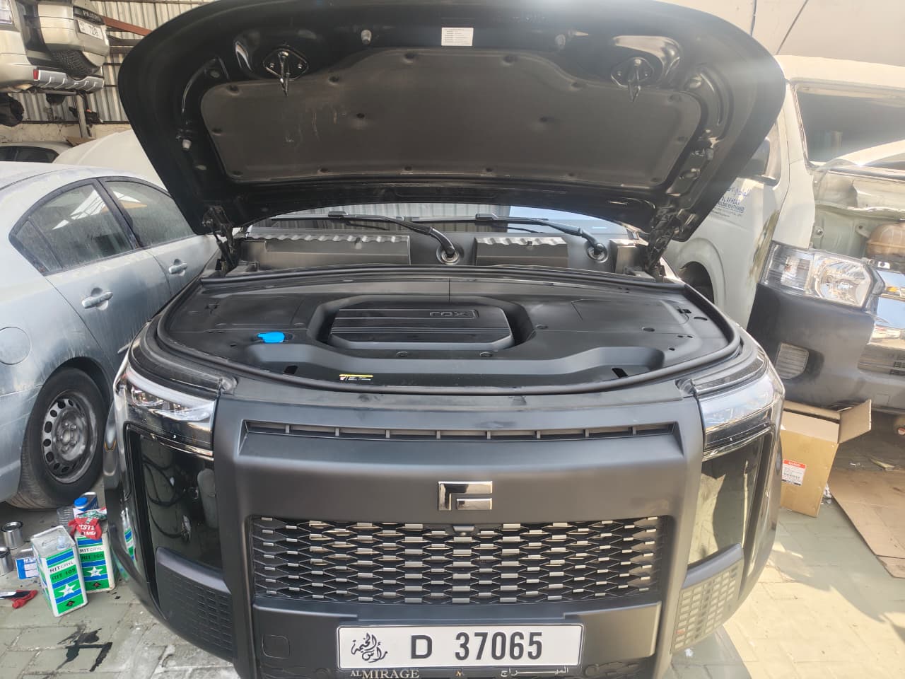 Open engine bay during service